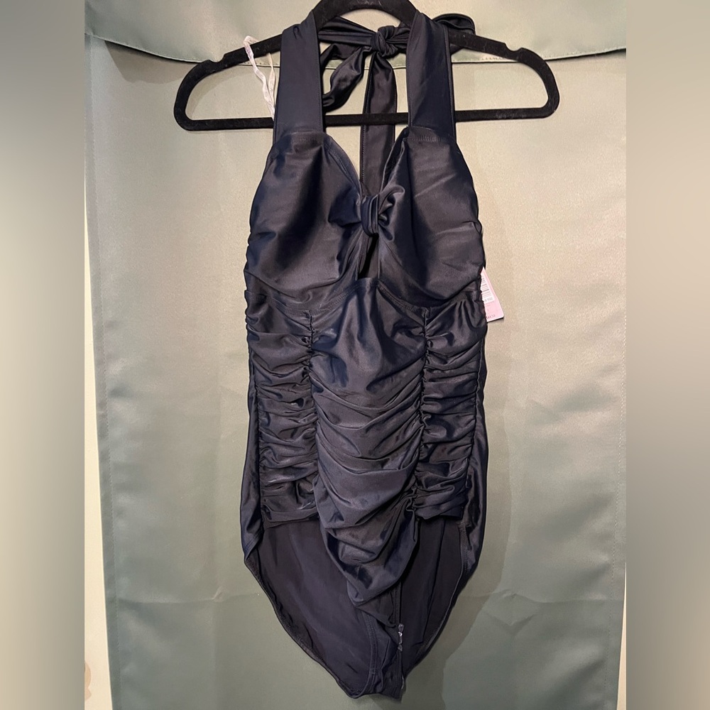 Plus size, black halter swimsuit by Torrid